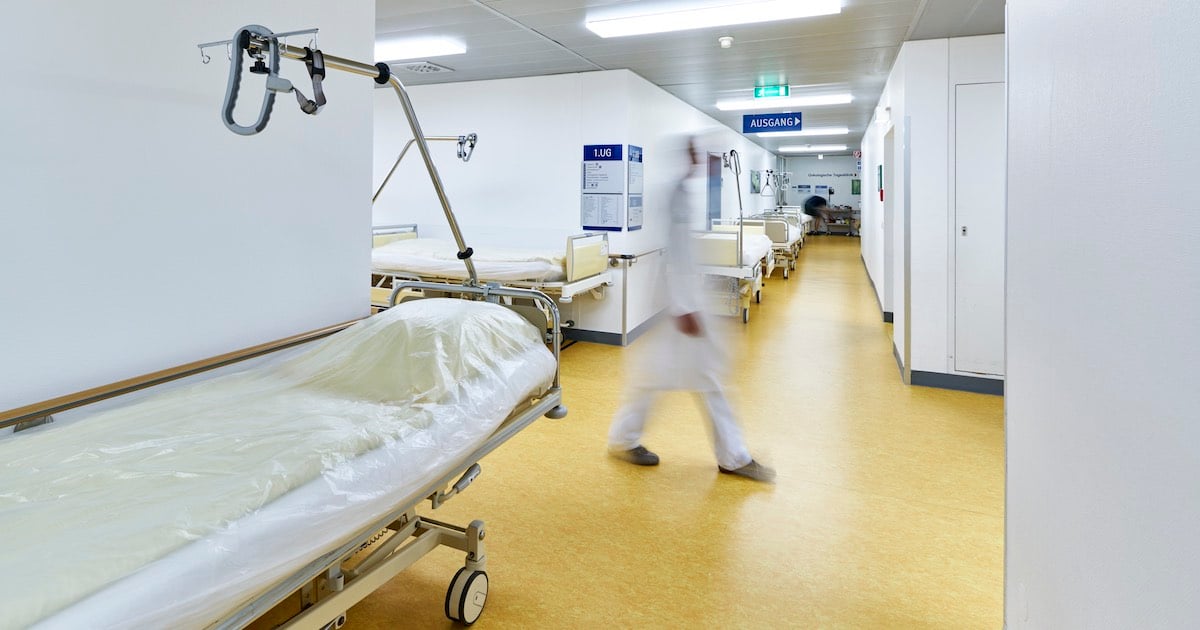 disappearing doctor in hospital hallway 