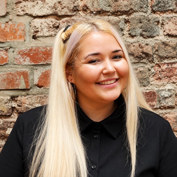Generated image_ Smiling Blonde Portrait Against Brick